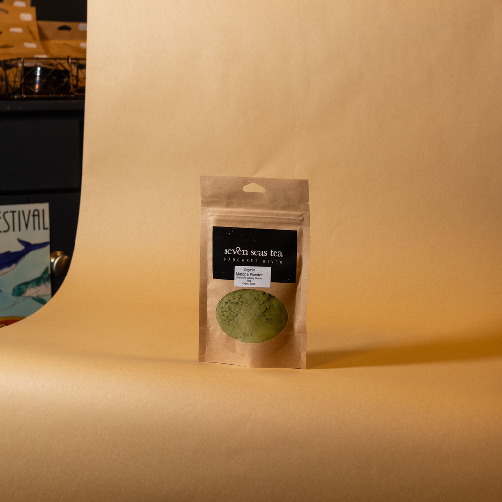 Organic Matcha Powder kraft pouch on a brown paper backdrop, Seven Seas Tea Margaret River