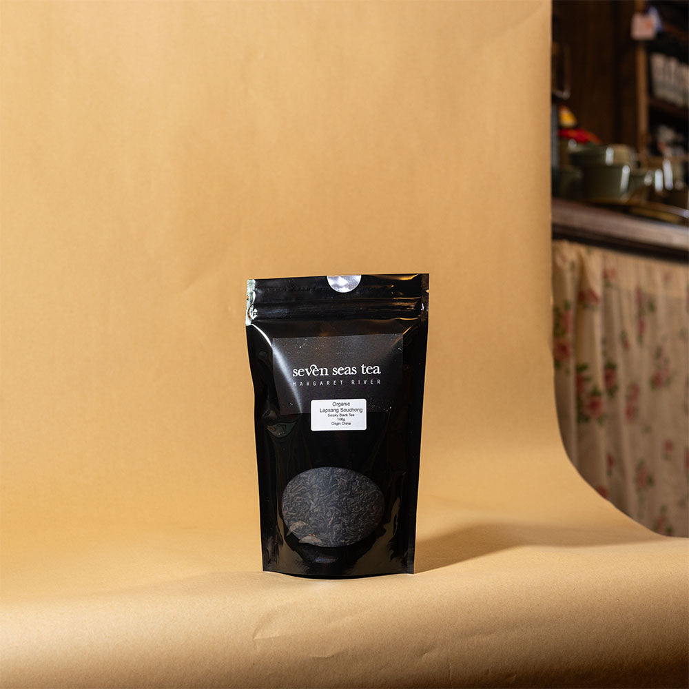 Lapsang Souchong pouch on a brown paper backdrop, Seven Seas Tea Margaret River