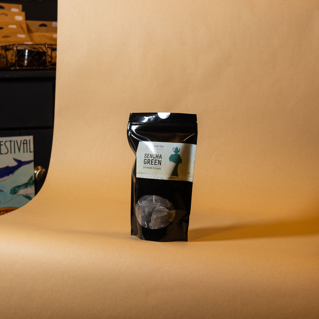 Organic Sencha Green Teabags pouch on a brown paper backdrop, Seven Seas Tea Margaret River