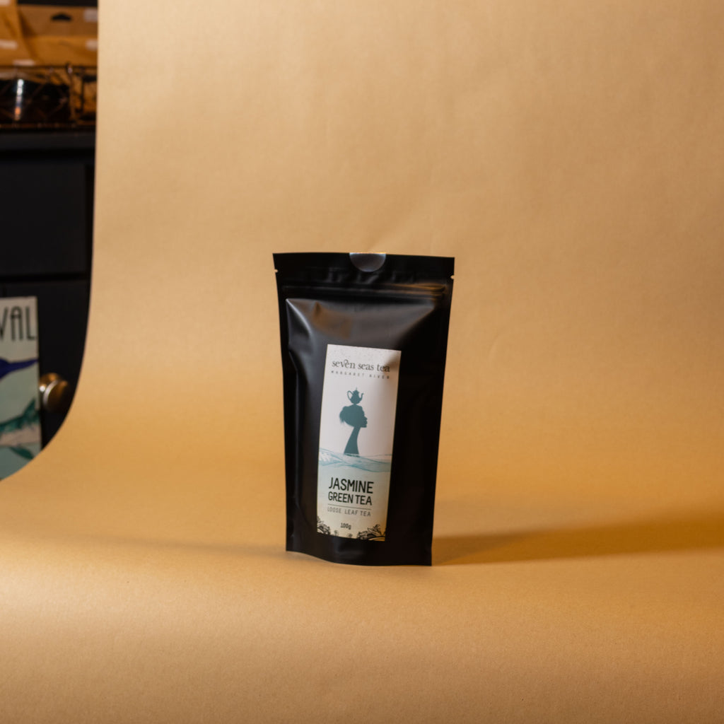 Organic Jasmine Green Tea pouch on a brown paper backdrop, Seven Seas Tea Margaret River