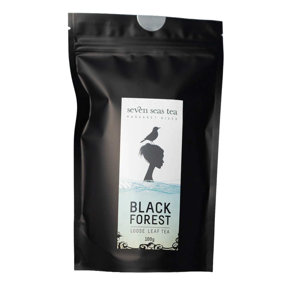 Black Seven Seas Tea pouch of Black Forest with a window showing the leaf