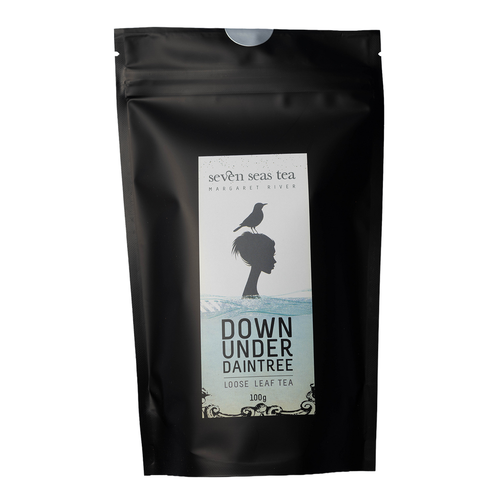 Black Seven Seas Tea pouch of Down Under Daintree with a window showing the leaf