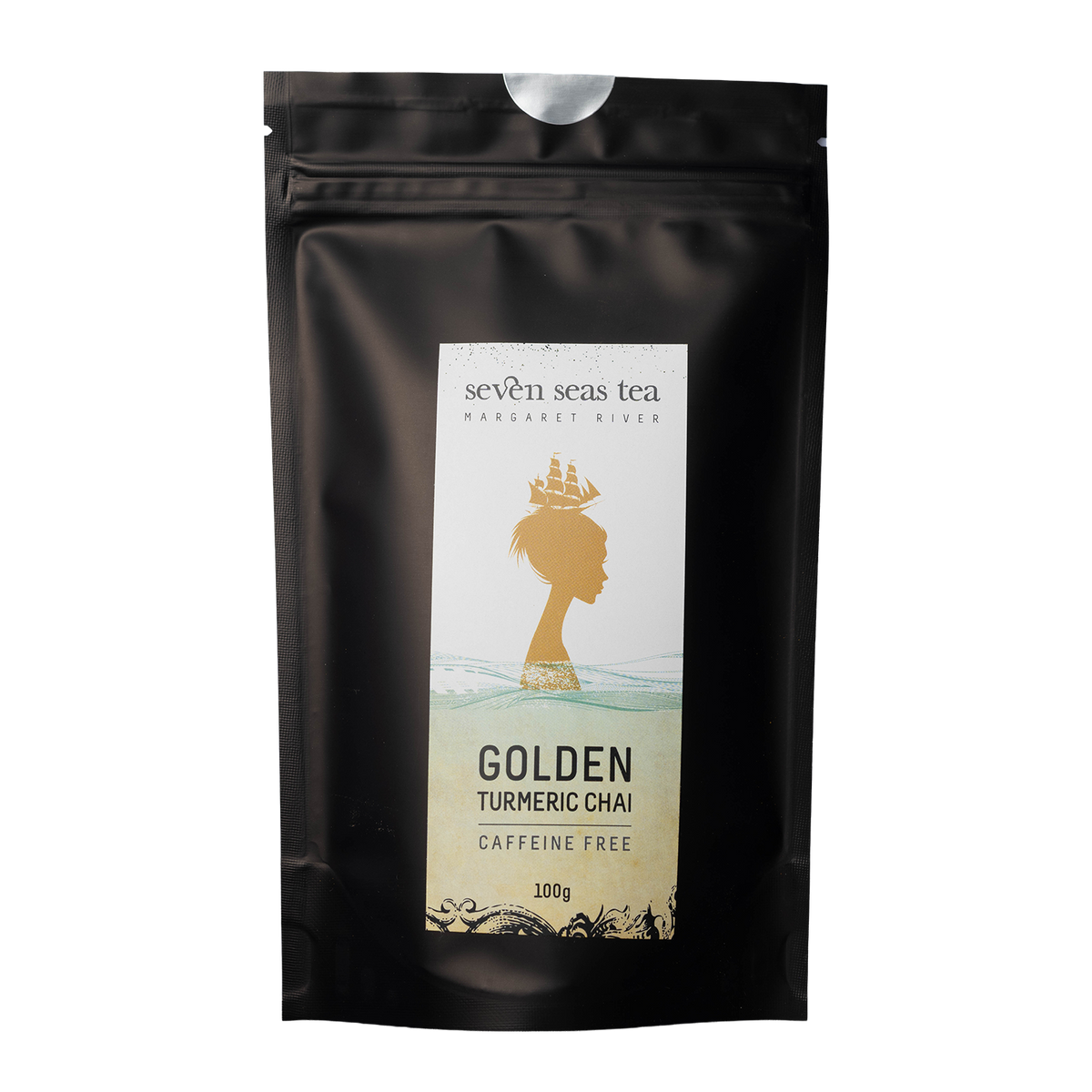 Black Seven Seas Tea pouch of Golden Turmeric Chai with a window showing the leaf