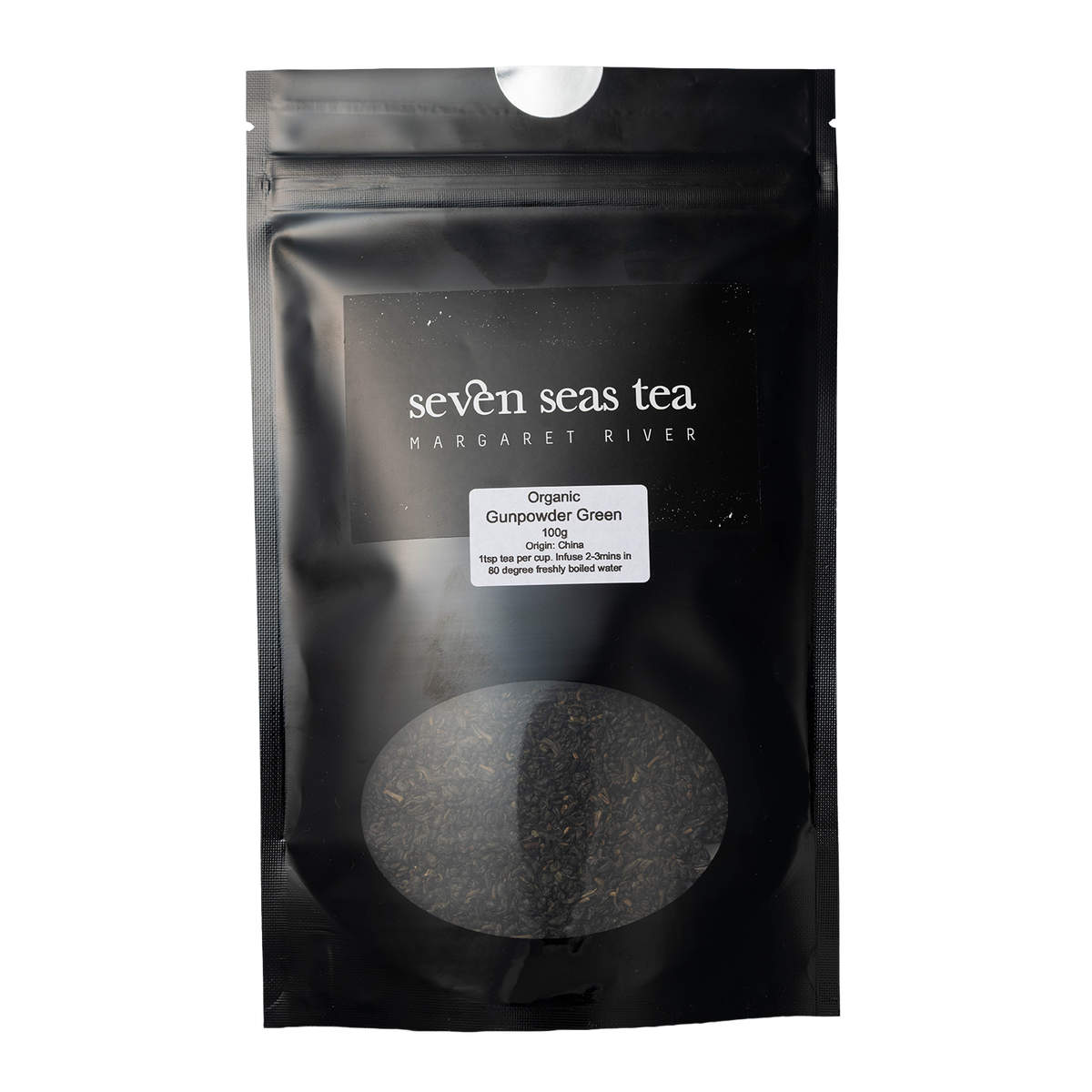 Black Seven Seas Tea pouch of Organic Gunpowder Green with a window showing the leaf