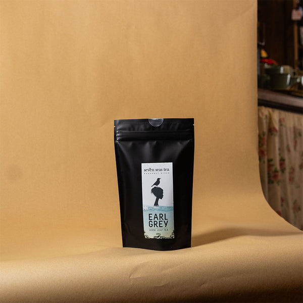 Organic Earl Grey pouch on a brown paper backdrop, Seven Seas Tea Margaret River