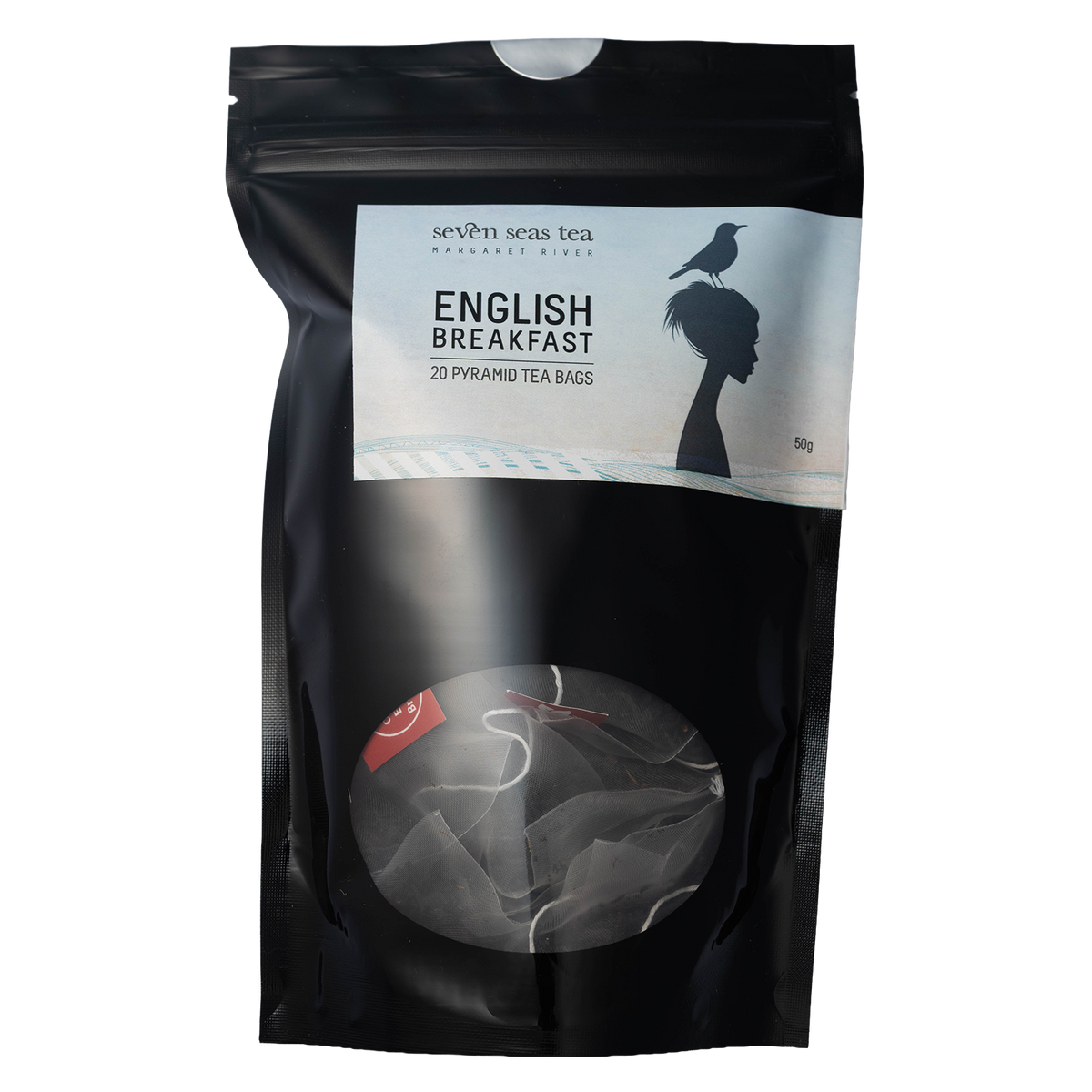 Black pouch of Organic English Breakfast Tea Bags with a pyramid bag in the window