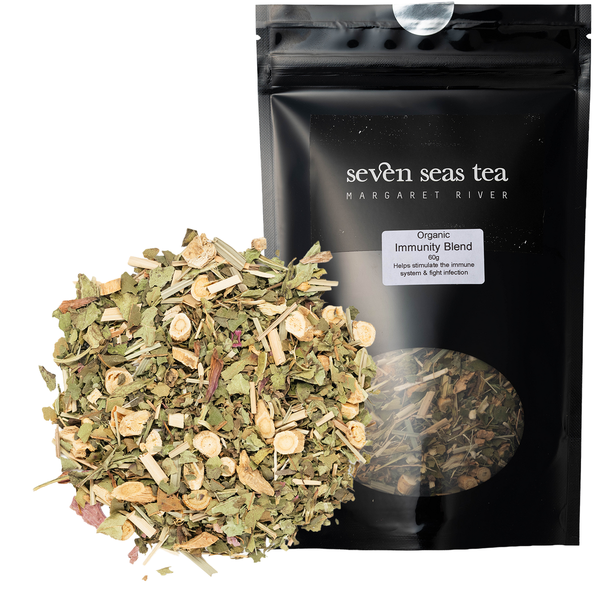 Loose leaf Organic Immunity Blend piled beside its black Seven Seas Tea pouch
