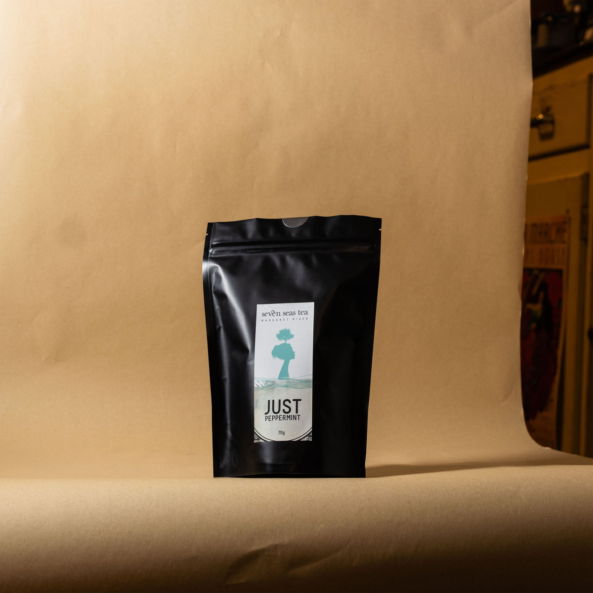 Organic Peppermint pouch on a brown paper backdrop, Seven Seas Tea Margaret River