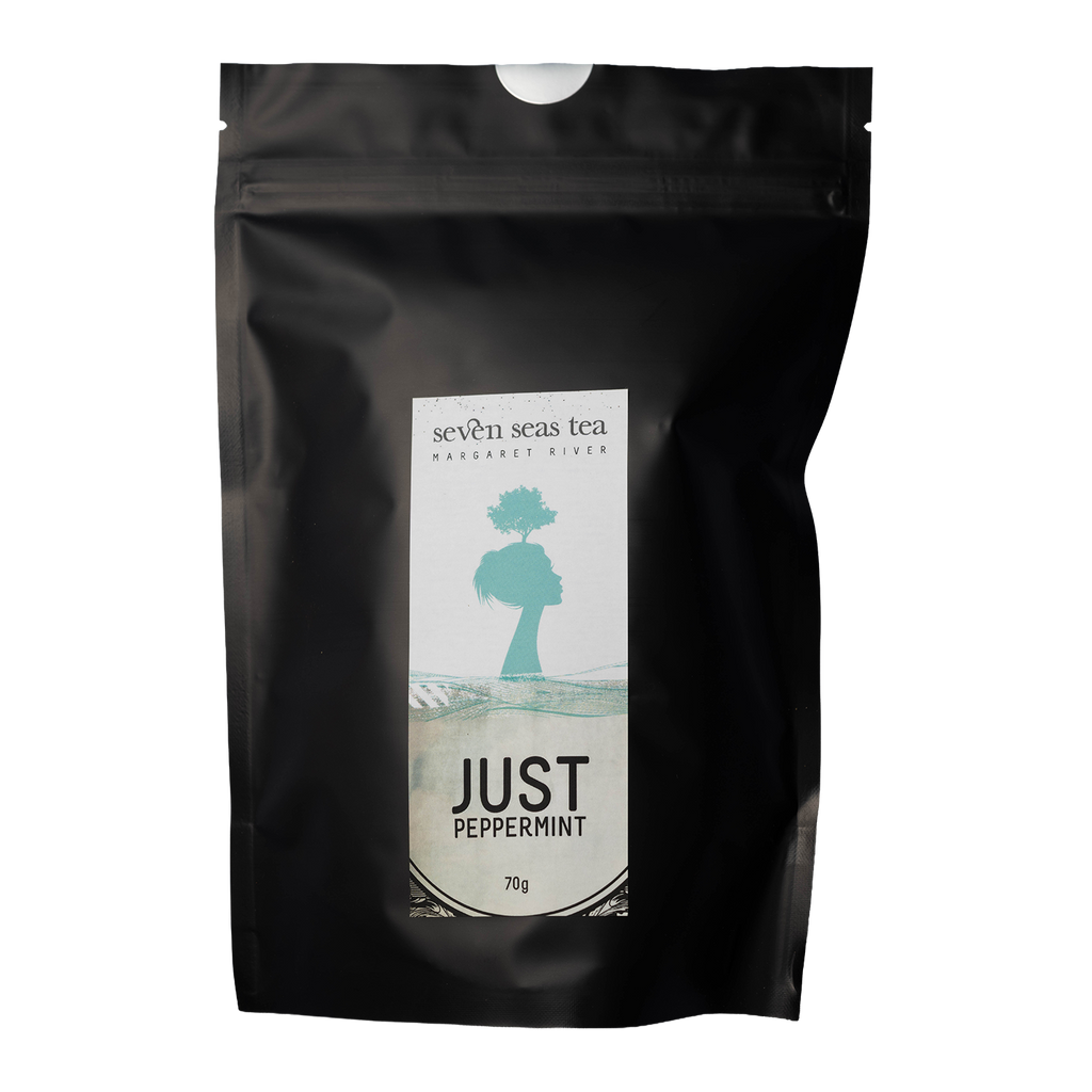 Black Seven Seas Tea pouch of Organic Peppermint with a window showing the leaf