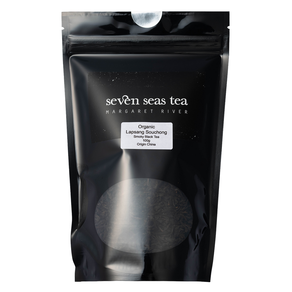 Black Seven Seas Tea pouch of Lapsang Souchong with a window showing the leaf