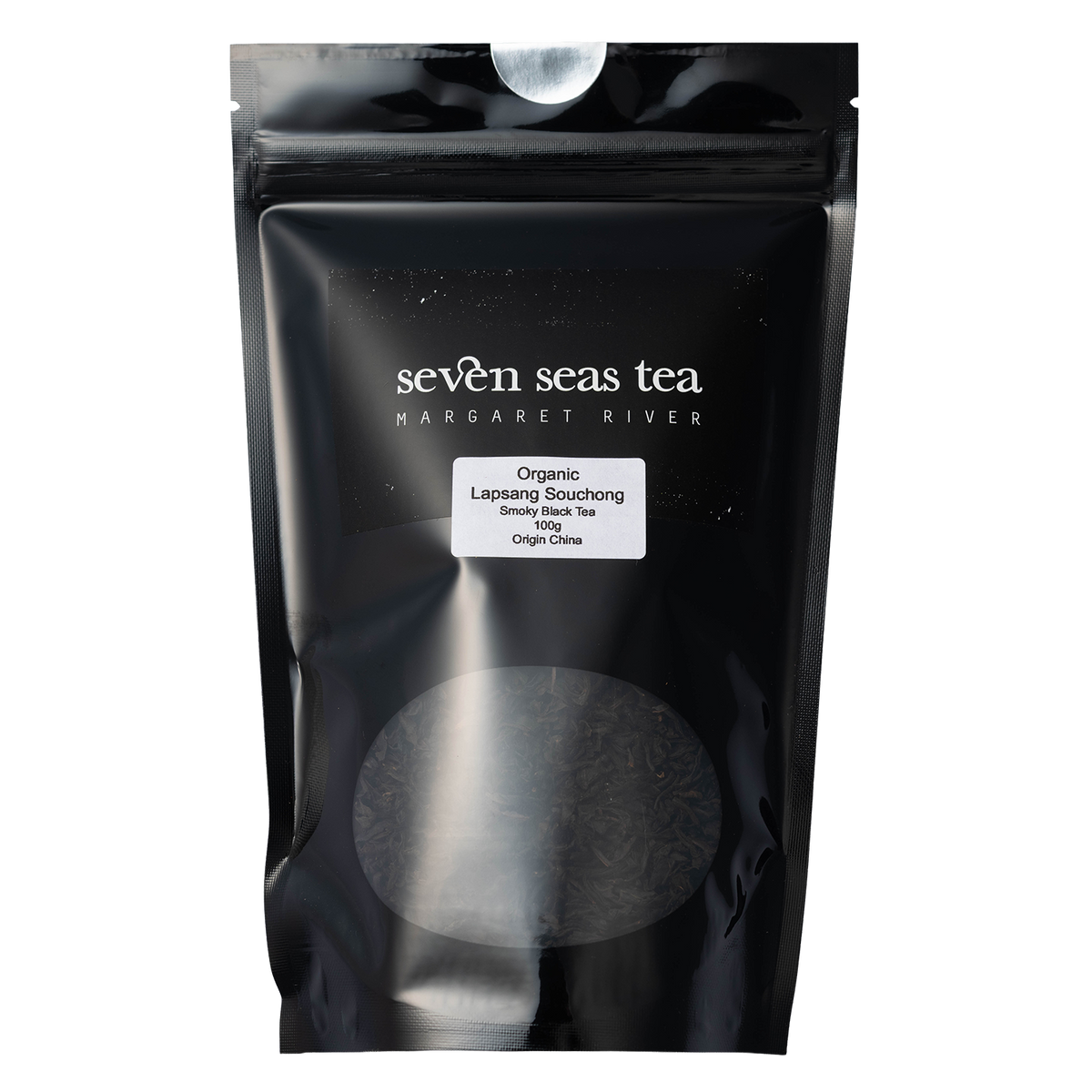 Black Seven Seas Tea pouch of Lapsang Souchong with a window showing the leaf