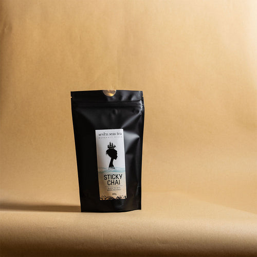 Organic Sticky Chai pouch on a brown paper backdrop, Seven Seas Tea Margaret River
