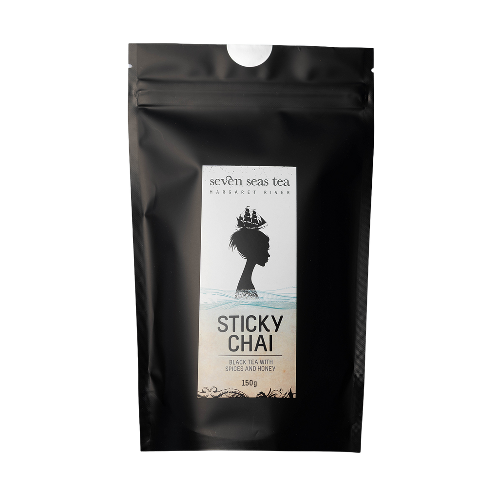 Black Seven Seas Tea pouch of Organic Sticky Chai with a window showing the leaf