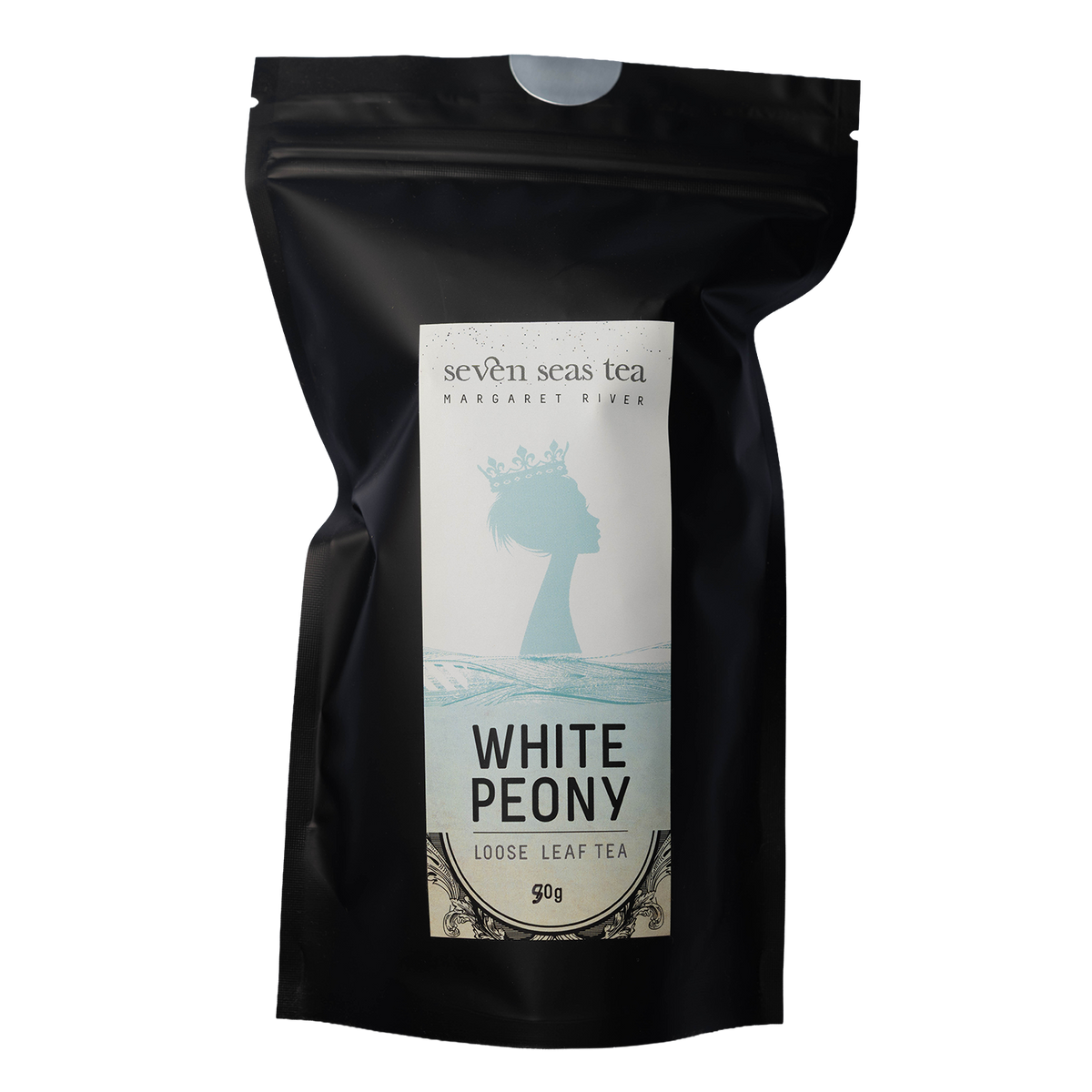 Black Seven Seas Tea pouch of White Peony with a window showing the leaf