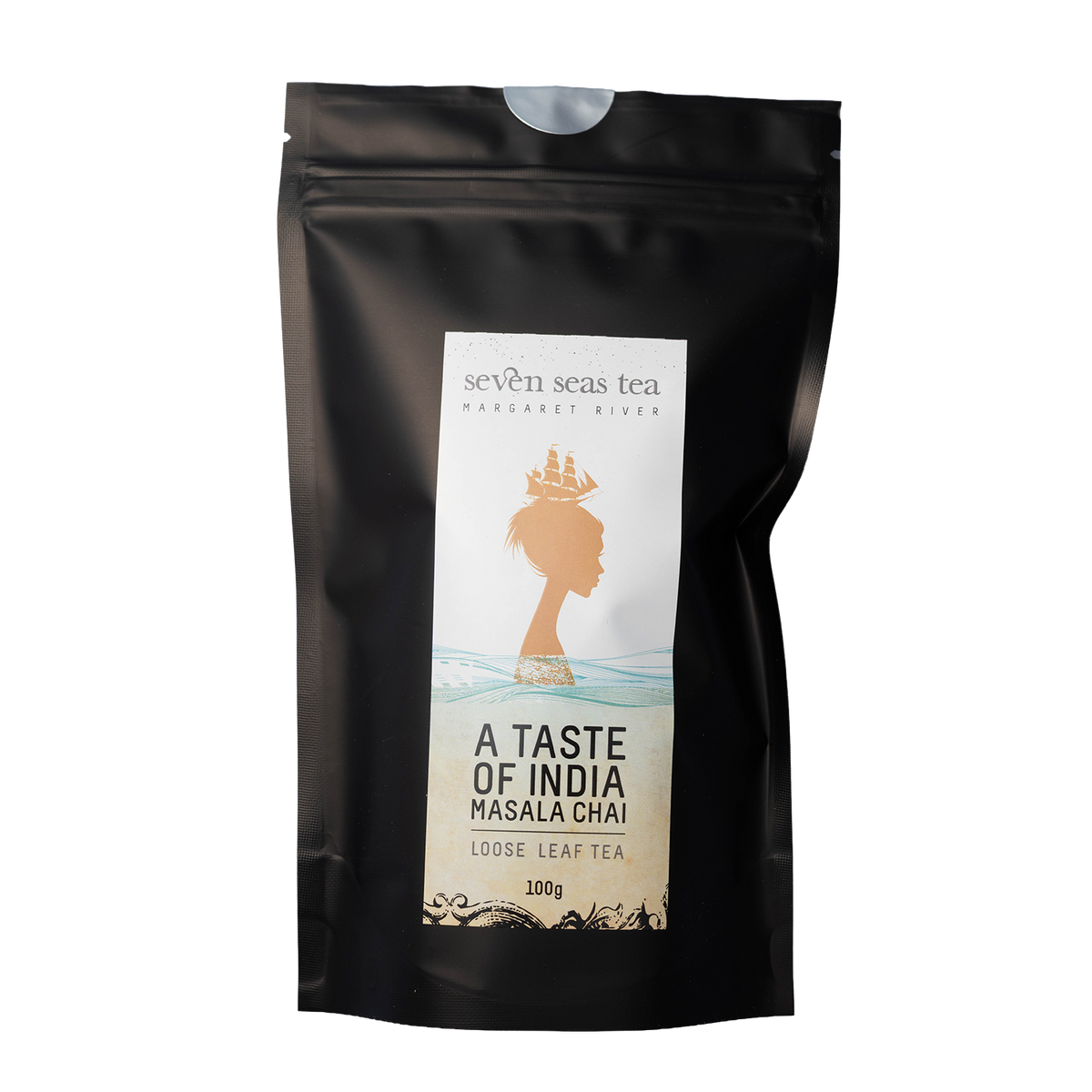 Black pouch of Taste of India Organic Masala Chai with a window showing the leaf