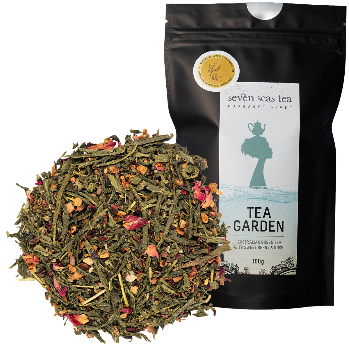 Tea Garden green tea loose leaf piled beside its black pouch with a medal sticker